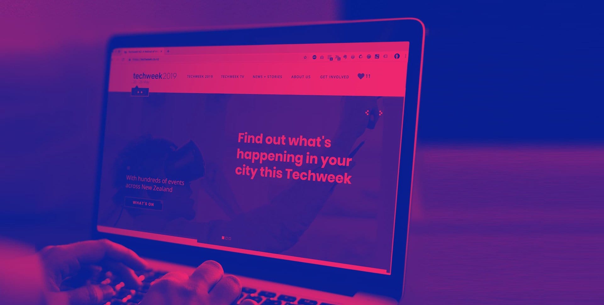Person using laptop with Techweek home page and image has blue and pink treatment